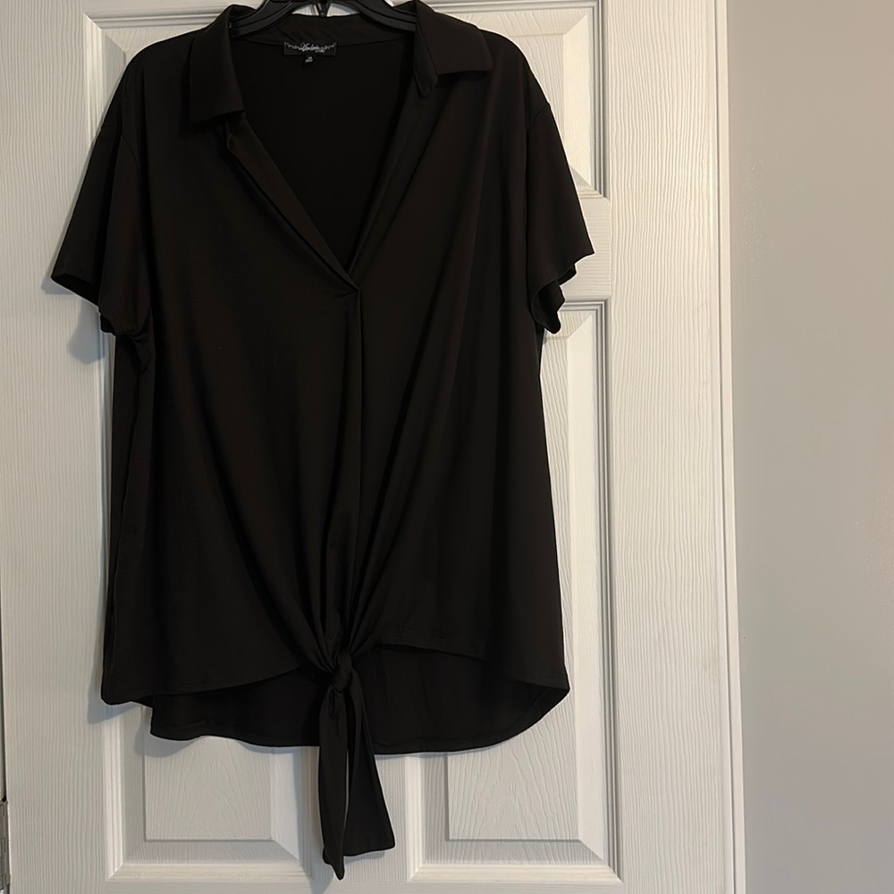 NEW NEVER WORN! Black shirt with tie knot detail on the bottom.
